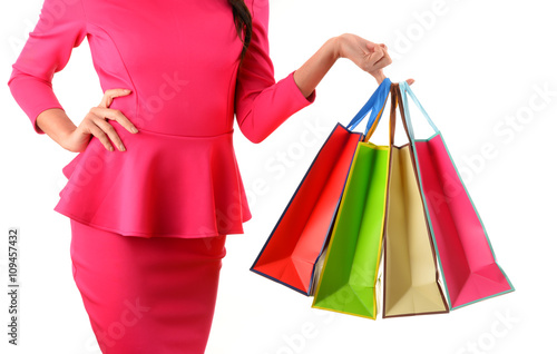 Young woman with bags in shopping mall