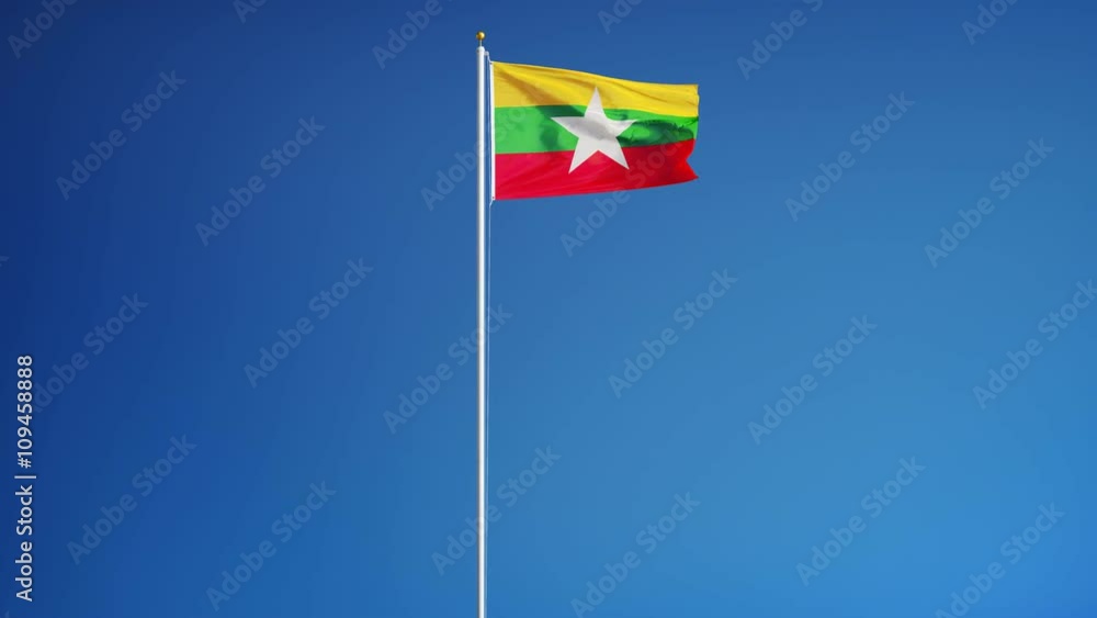 Myanmar flag waving in slow motion against clean blue sky, seamlessly looped, long shot, isolated on alpha channel with black and white luminance matte, perfect for film, news, digital composition