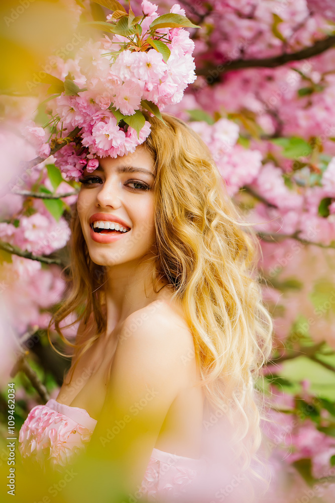 Glamour girl in pink blossom