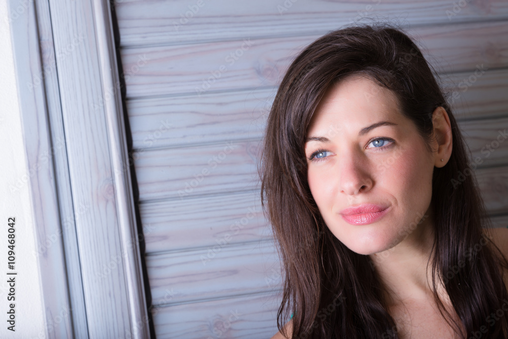 Portrait of beautiful young brunette woman outside Portrait of beautiful young brunette woman outside