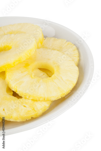 plate of pineapple slices