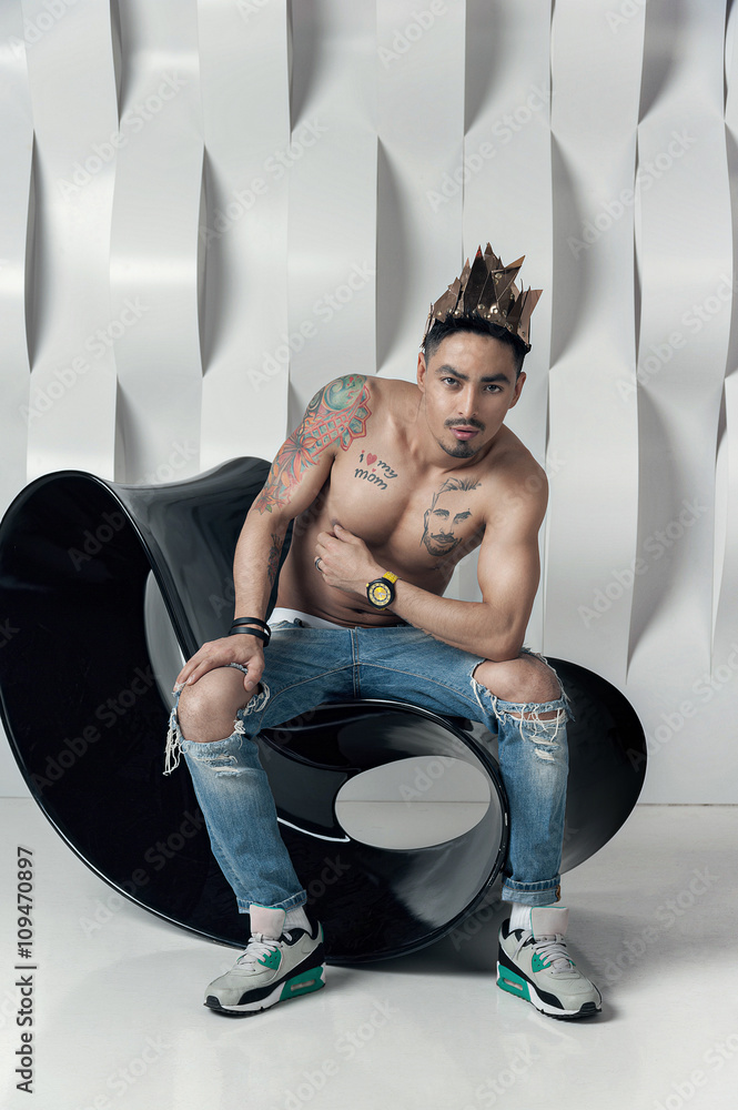 Fit sexy shirtless asian man with tattoos sit on chair in modern foto de  Stock | Adobe Stock