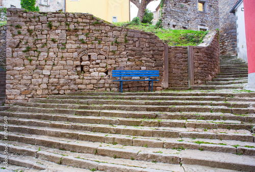 View of blue bench photo