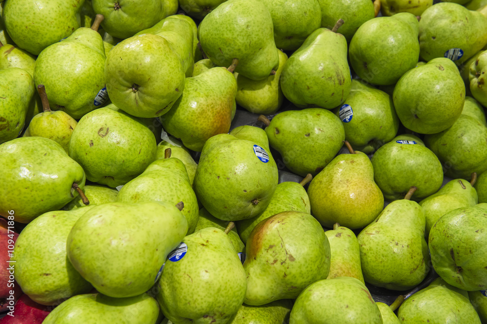 fresh green pears from market shelves real with flaws and bruise fresh green pears from market shelves real with flaws and bruise