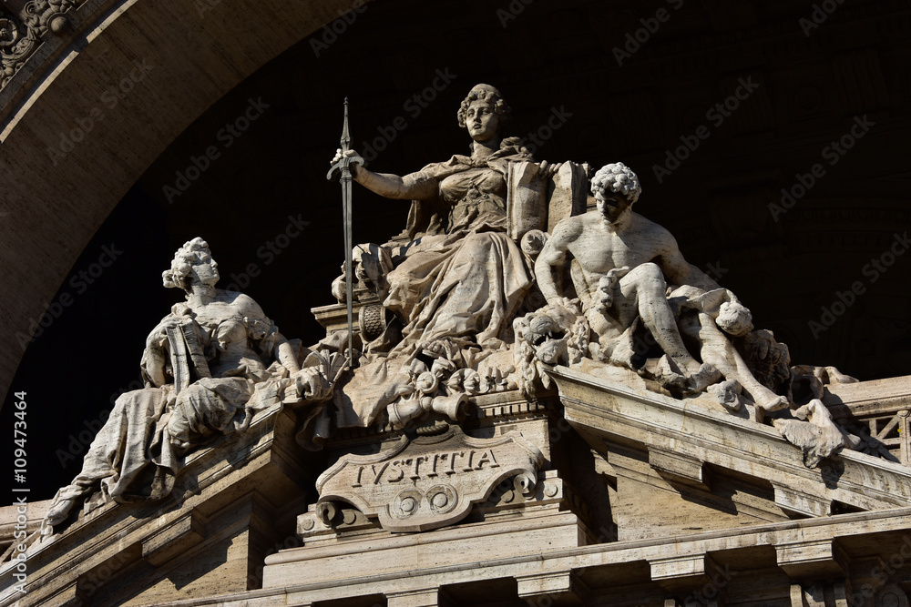 Goddess of Justice with sword from the old Palace of Justice in Rome, built in a neo-baroque style at the end of 19th century 