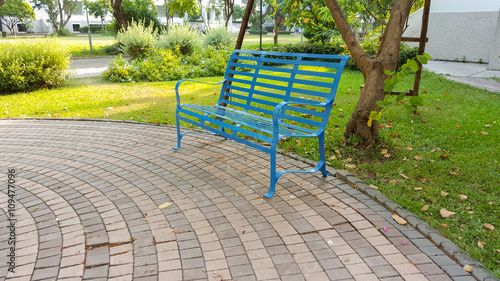Fototapeta Naklejka Na Ścianę i Meble -  Steel bench in the park 