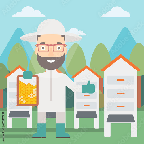 Bee-keeper at apiary.