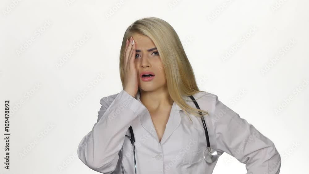 Young doctor is in a fright. White Young doctor is in a fright. White