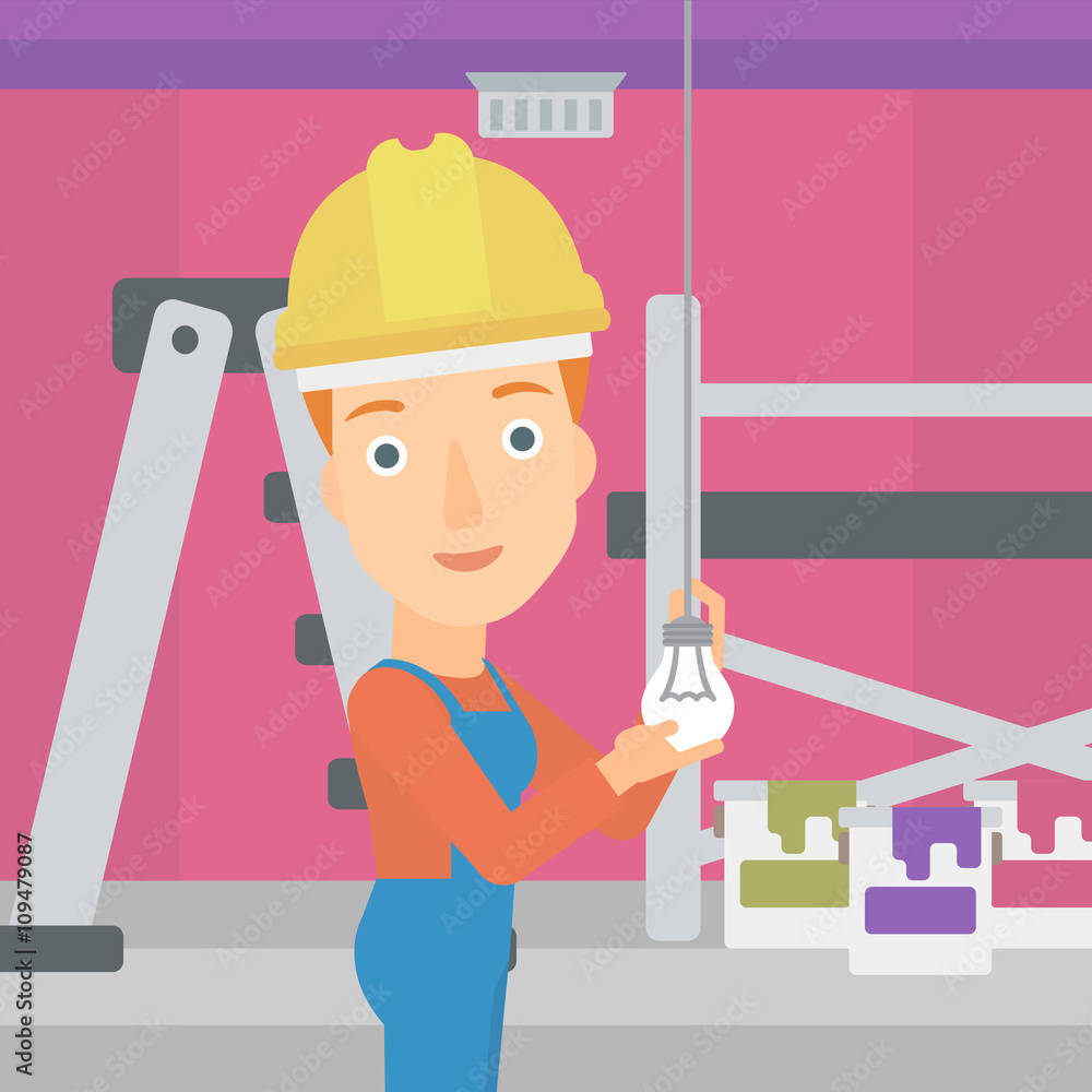 Electrician twisting light bulb. Electrician twisting light bulb.