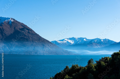 Lake Wanaka landscape with snow covered mountains
