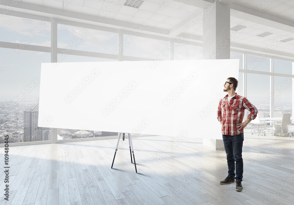 Guy with presentation board Guy with presentation board
