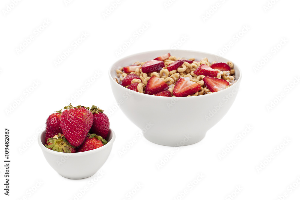 cereal with strawberries slice and bowl of strawberries cereal with strawberries slice and bowl of strawberries