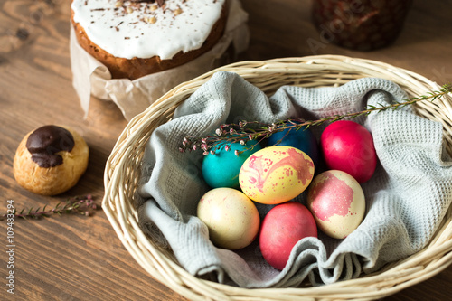 Colored Easter eggs in basket