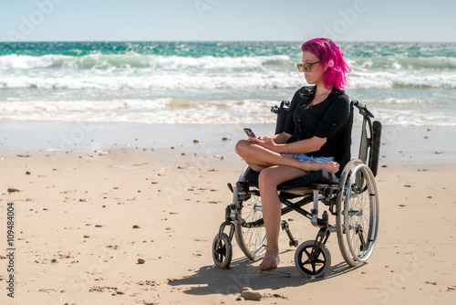 Fotografie Disabled woman at the beach