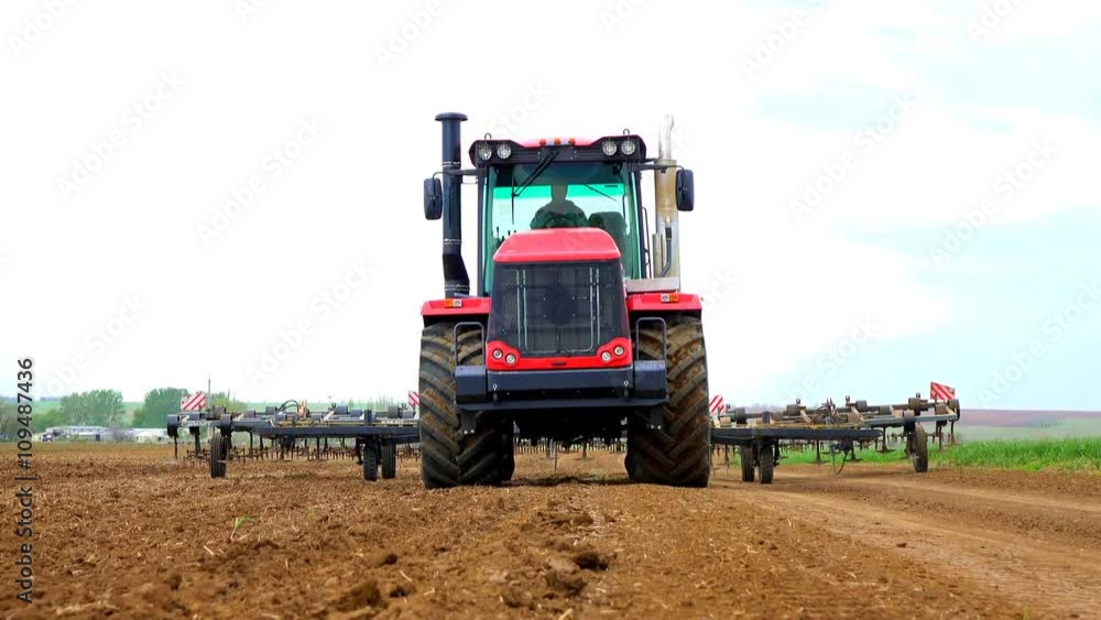 Tractors preparing land for sowing 4K UHD Tractors preparing land for sowing 4K UHD