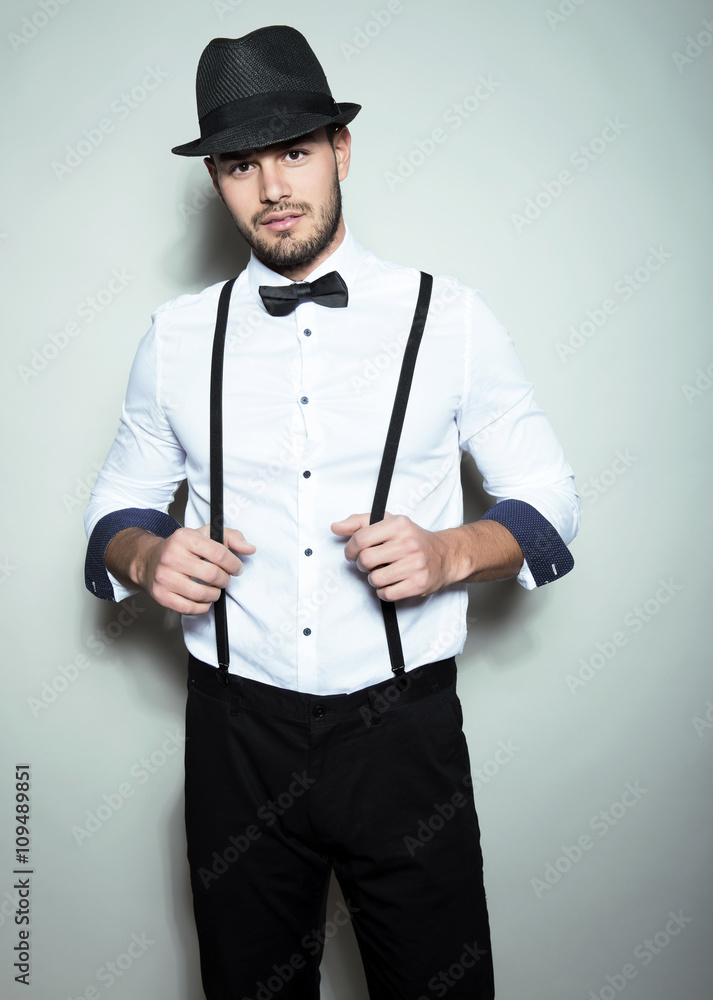 handsome young man with hat and wrist watch handsome young man with hat and wrist watch