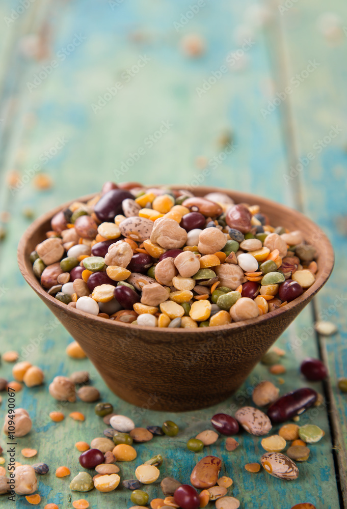 Raw legume on old rustic wooden table. Raw legume on old rustic wooden table.