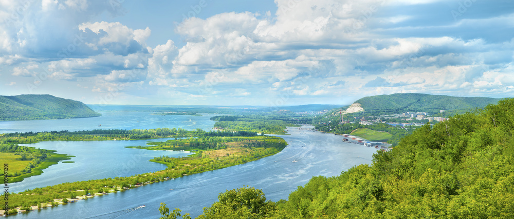Amazing panoramic view from the height on the touristic part of the Volga river near Samara city at summer sunny day.Beautiful natural landscape.Picturesque central part of Russia.Europe.
