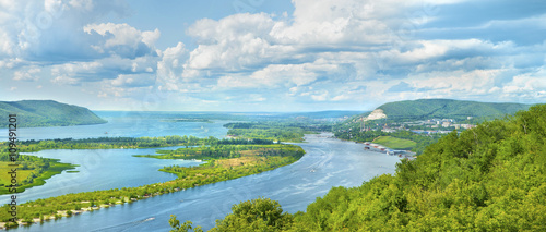Amazing panoramic view from the height on the touristic part of the Volga river near Samara city at summer sunny day.Beautiful natural landscape.Picturesque central part of Russia.Europe. photo