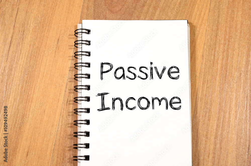 Passive income write on notebook Passive income write on notebook