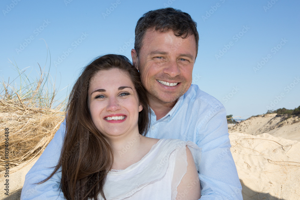 Amorous couple having romantic vacation by the sea Amorous couple having romantic vacation by the sea