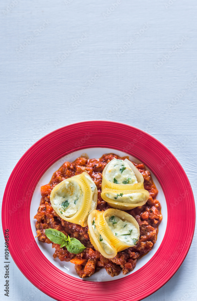Lumaconi stuffed with ricotta with bolognese sauce Lumaconi stuffed with ricotta with bolognese sauce