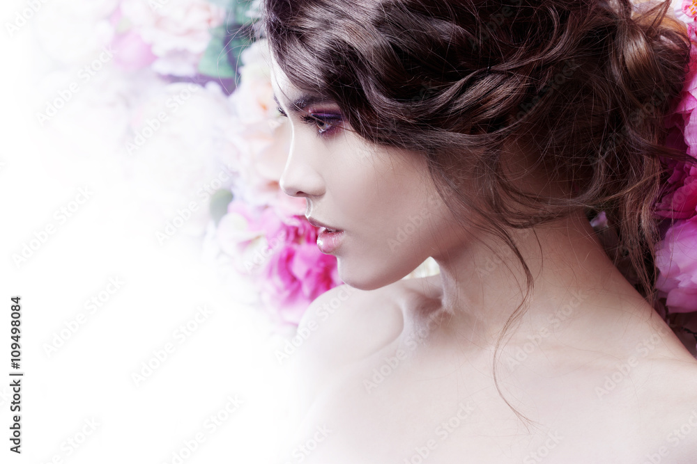 Profile of beautiful fashion girl, sweet, sensual. Beautiful makeup and messy romantic hairstyle. Flowers background. Profile of beautiful fashion girl, sweet, sensual. Beautiful makeup and messy romantic hairstyle. Flowers background.