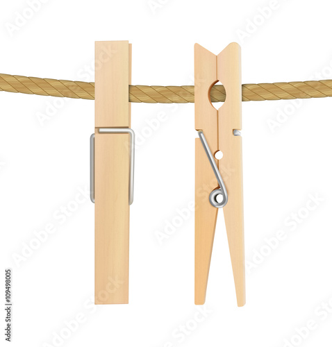 Two clothespins on rope background.