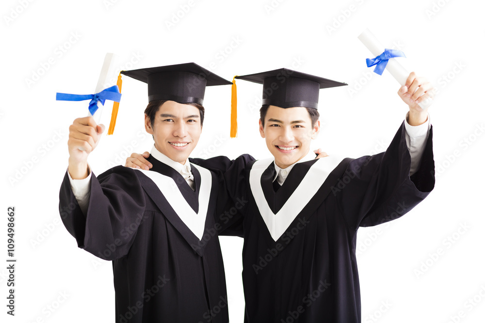 Two happy graduating students isolated on white Two happy graduating students isolated on white