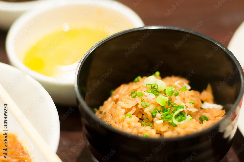 close up of a bowl of garlic fried rice close up of a bowl of garlic fried rice