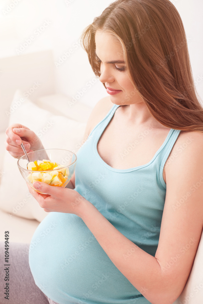 Pretty expectant mother prefers healthy food Pretty expectant mother prefers healthy food