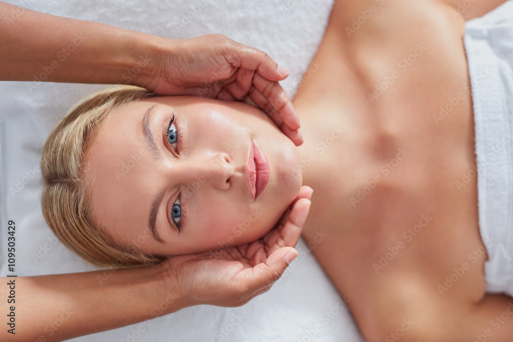 Beautiful woman having a face massage at health spa Beautiful woman having a face massage at health spa