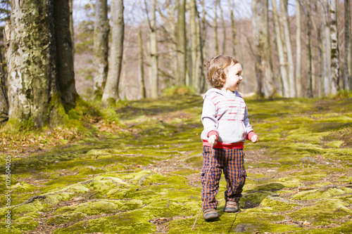 The child with the sticks to walk. © zhukovvvlad