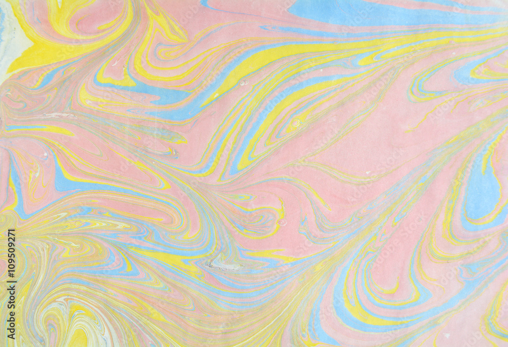 Ebru art. Traditional Turkish Ebru technique. Marbling painting on water transferred on highly textured paper or cloth. Color paint ebru with waves and tile pattern.