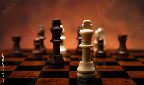 Photography chess game with pieces on the table