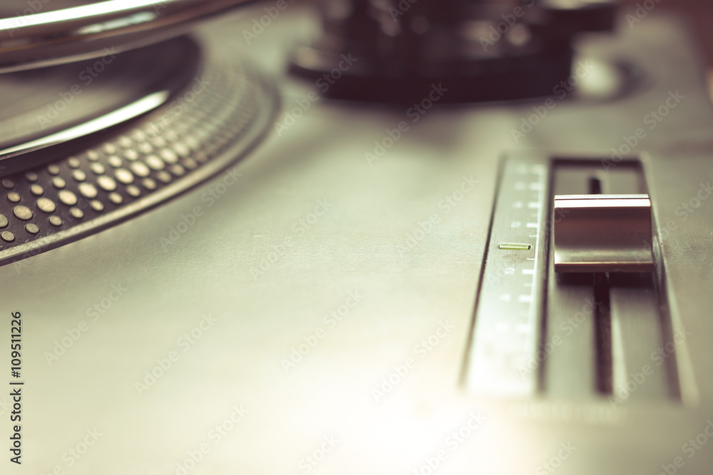 Pitch control in focus on vinyl player Pitch control in focus on vinyl player