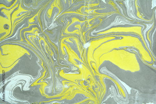 Ebru art. Traditional Turkish Ebru technique. Painting on water transferred on highly textured paper or cloth. Color paint ebru with waves and tile pattern.