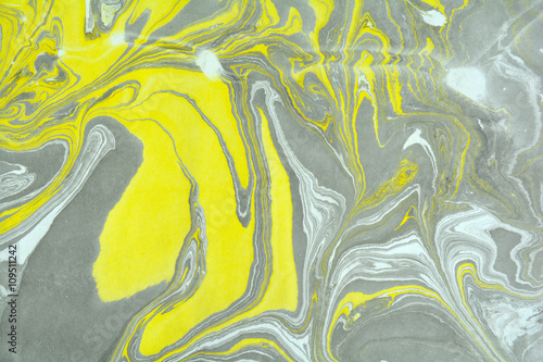 Ebru art. Traditional Turkish Ebru technique. Painting on water transferred on highly textured paper or cloth. Color paint ebru with waves and tile pattern.