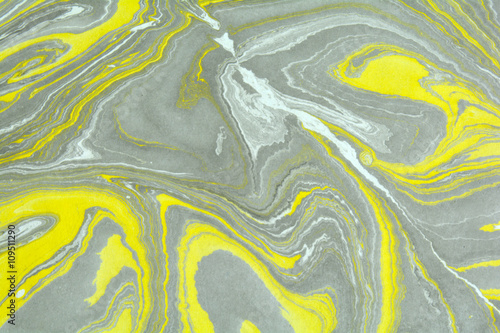 Ebru art. Traditional Turkish Ebru technique. Painting on water transferred on highly textured paper or cloth. Color paint ebru with waves and tile pattern.