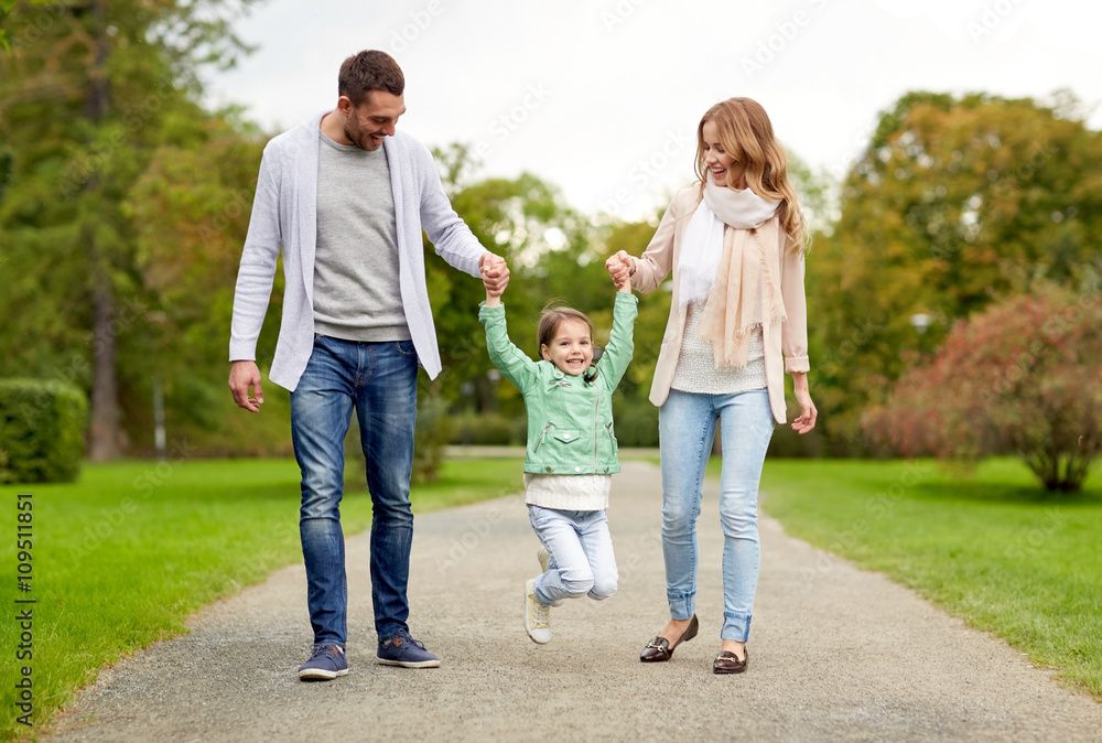 happy family walking in summer park and having fun happy family walking in summer park and having fun