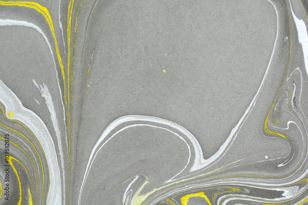 Obraz premium Abstract background. Ink marbling texture. Grey, yellow and white. Hand drawn marble illustration, ebru aqua paper and silk print. Traditional Turkish ebru technique. Painting on water. 