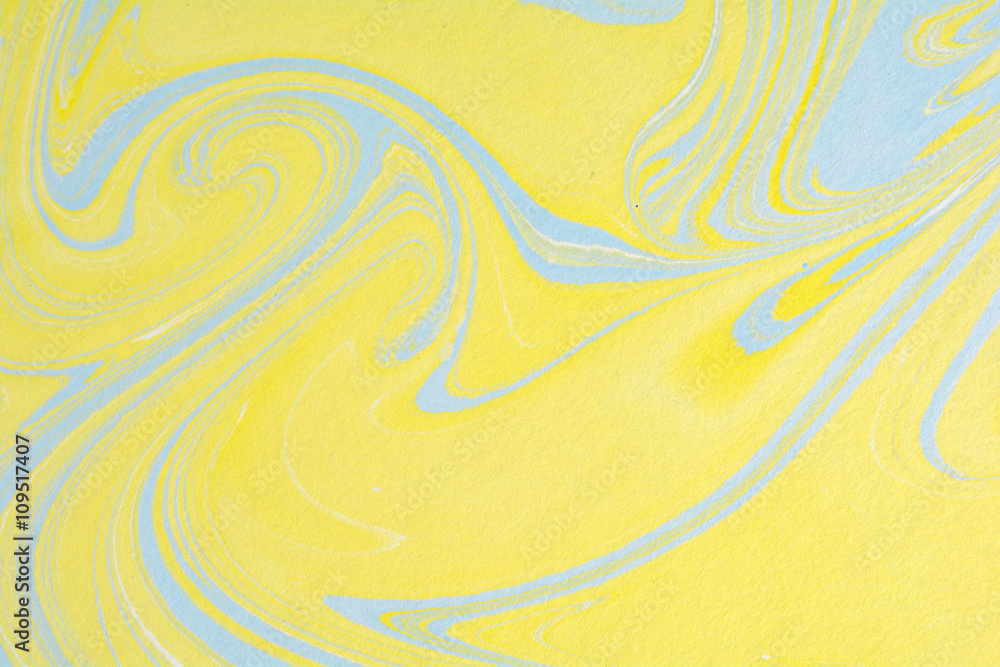 Naklejka premium Abstract handmade marble background. Ebru, traditional Turkish painting art. Painting on water. Transferred painting on paper. Marbling style. Writing surface for calligraphy, and book covers. 