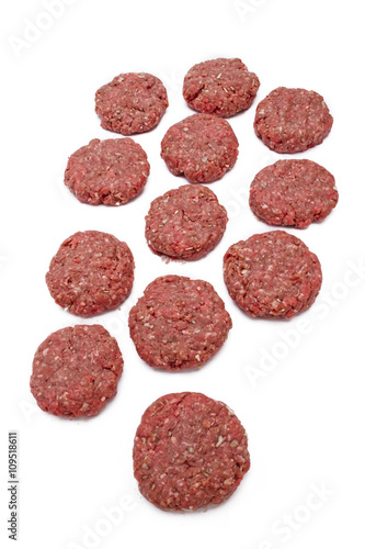 minced red meat arranged over white background.