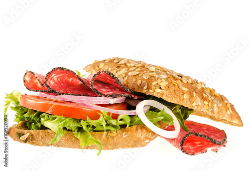 Fototapeta Naklejka Na Ścianę i Meble -  salami sandwich with full-corn bread on isolated on white