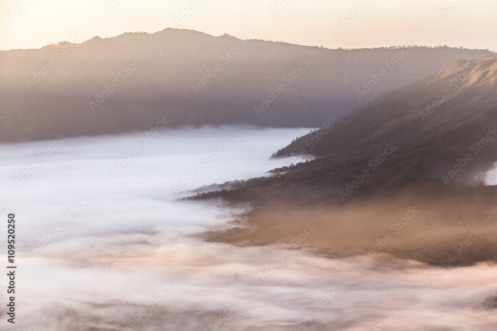 Mount Bromo landscape at sunrise with clouds