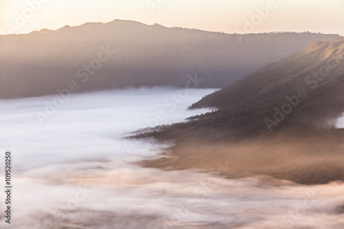 Mount Bromo landscape at sunrise with clouds