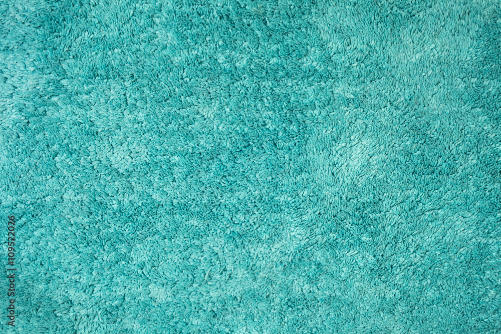 Obraz premium Texture of turquoise rug made of cotton wool