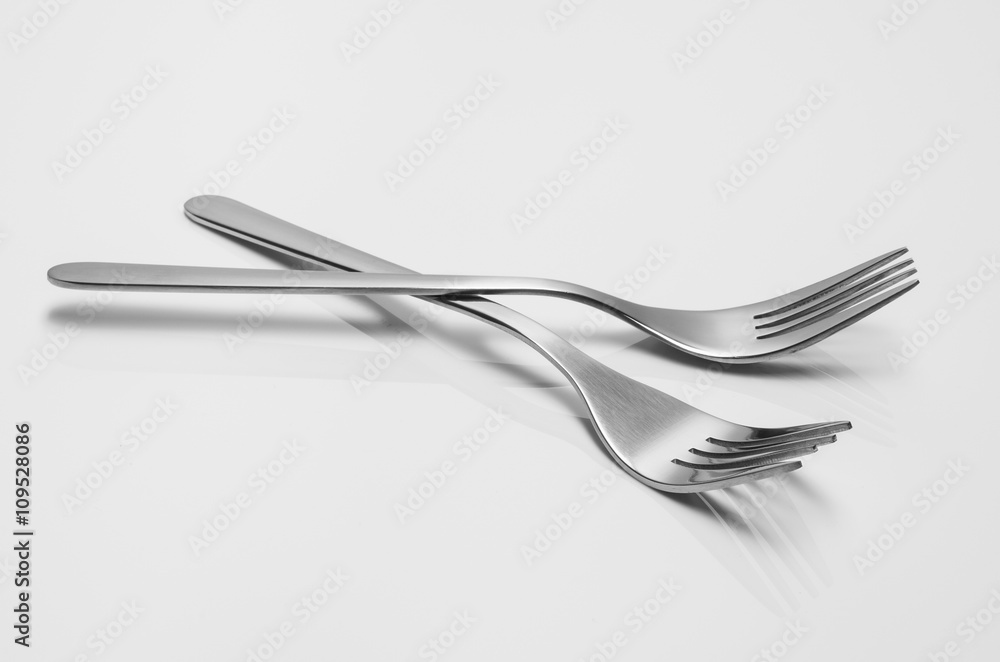 Silverware or flatware set isolated on white background. Concept composition with copy space Silverware or flatware set isolated on white background. Concept composition with copy space