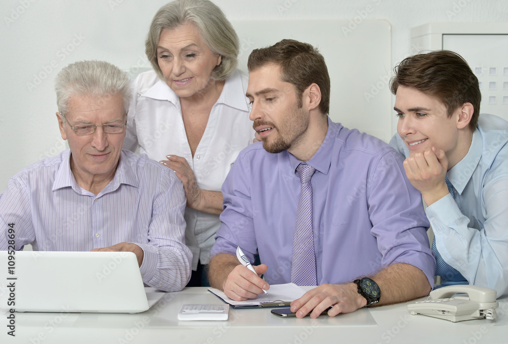 Fototapeta premium businesspeople at office with laptop