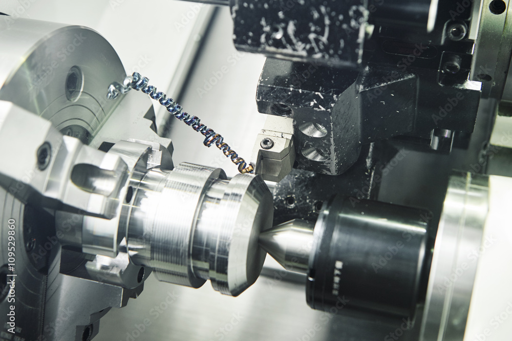 metal working. cutting tool pefroming turning operation at cnc machine metal working. cutting tool pefroming turning operation at cnc machine